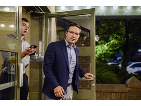 Poilievre leaves an August campaign rally in London, Ont.