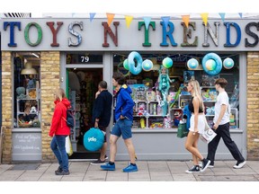 Pedestrians pass a toy store in Whitstable, U.K., on Tuesday, Aug 17, 2022. Photographer: Chris Ratcliffe/Bloomberg