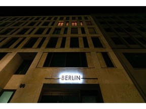 A partially lit office building in central Berlin. Photographer: Krisztian Bocsi/Bloomberg