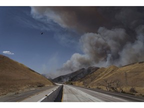 Interstate 5 shut down during the Route Fire in Castaic, California, US, on Wednesday, Aug. 31, 2022. A fast-growing brush fire forced evacuations and the closure of I-5 near Los Angeles on Wednesday afternoon as California braces for the dual onslaught of a heat wave and Labor Day weekend travel, reported the San Francisco Chronicle.