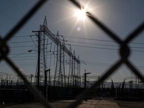 Electrical transmission towers at a Pacific Gas and Electric (PG&E) electrical substation during a heatwave in Vacaville, California, US, on Sunday, Sept. 4, 2022. Blisteringly hot temperatures and a rash of wildfires are posing a twin threat to California's power grid as a heat wave smothering the region peaks in the days ahead.