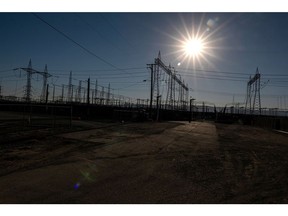 Electrical transmission towers at a Pacific Gas and Electric (PG&E) electrical substation during a heatwave in Vacaville, California, US, on Sunday, Sept. 4, 2022. Blisteringly hot temperatures and a rash of wildfires are posing a twin threat to California's power grid as a heat wave smothering the region peaks in the days ahead.