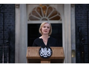 Liz Truss, UK prime minister, makes a statement following the death of Queen Elizabeth II outside 10 Downing Street in London, UK, on Thursday, Sept. 8, 2022. Queen Elizabeth II, whose reign took Britain from the age of steam to the era of the smartphone, and who oversaw the largely peaceful breakup of an empire that once spanned the globe, has died.