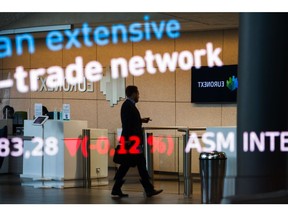 Stock price information displayed in the lobby of the Euronext NV stock exchange in Paris, France, on Thursday, Sept. 15, 2022. European stock investors are grappling with sticky inflation, hawkish central banks and a worsening energy crisis. Photographer: Nathan Laine/Bloomberg