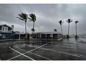 A closed restaurant at Fort Myers Beach in Fort Myers, Florida, US, on Wednesday, Sept. 28, 2022. Hurricane Ian rapidly gained strength -- with winds reaching 155 miles an hour -- as it barreled toward the coast of Florida, threatening to rip roofs off of homes, wreck agricultural crops and cripple infrastructure as one of the costliest storms to ever hit the US.
