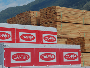 Canfor is cutting back production in British Columbia as the price for lumber continues to decline.