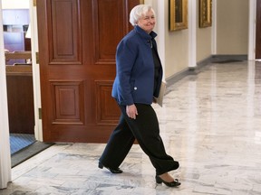 Treasury Secretary Janet Yellen smiles as she walks to attend a meeting with Indonesian Coordinating Minister for Maritime Affairs and Investment Luhut Binsar Pandjaitan, Friday, Sept. 16, 2022, at Treasury Department in Washington.
