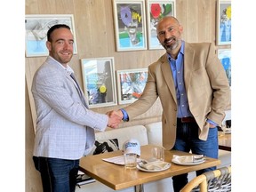 Channce Fuller, President and CEO of Progressus and Frank Carnevale, CEO of Alkaline Fuel Cell Power Corp. shake hands upon finalizing the LOI.