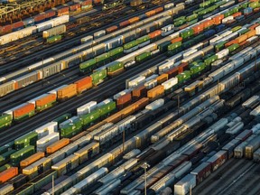 Freight train cars sit in a Norfolk Southern rail yard on Wednesday, Sept. 14, 2022, in Atlanta. President Joe Biden said Thursday that a tentative railway labor agreement has been reached, averting a strike that could have been devastating to the economy before the pivotal midterm elections.