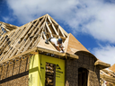 Investment in residential housing continued to fall in the fourth quarter, Statistics Canada data showed.