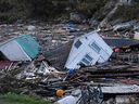 Houses float after Hurricane Fiona in Rose Blanche, Newfoundland.  Damages will likely produce record insured losses in Atlantic Canada. 