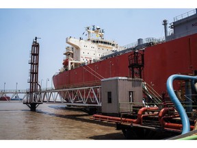 A liquefied natural gas (LNG) tanker docks at the LNG terminal of the Haldia Dock Complex in Haldia, West Bengal, India.