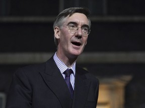 Newly installed Business Secretary Jacob Rees-Mogg leaves Downing Street, London, after meeting new Prime Minister Liz Truss, Tuesday, Sept. 6, 2022.