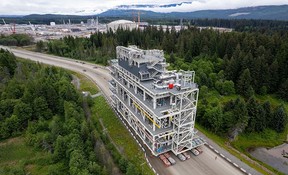 A module for the LNG Canada natural gas liquefaction plant is delivered to the site in Kitimat, B.C. The project is advancing quickly, with its workforce slated to peak next year at around 7,500 workers.