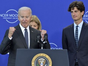 President Joe Biden with Ambasssador Caroline Kennedy and her son Jack Schlossberg on stage following an addresses an audience at the John F. Kennedy Presidential Library and Museum, Monday, Sept. 12, 2022, in Boston.