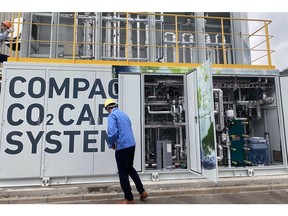 The compact carbon dioxide capture system installed at a biomass-fueled power plant in Hiroshima. Photographer: Shoko Oda/Bloomberg&ampnbsp;