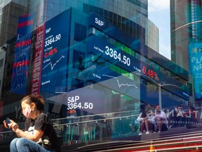Monitors display S&P 500 market information at Morgan Stanley's headquarters in New York, U.S.