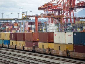 Containers on rail cars waiting to be shipped east by rail at the Port of Vancouver.