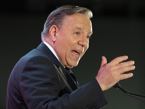 Quebec Premier François Legault speaks to the Chamber of Commerce while campaigning in Montreal.