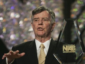 FILE - Lowry Mays, chairman of the Board of Clear Channel Communications, accepts the distinguished service award from the National Association of Broadcasters convention on April 18, 2005, in Las Vegas. Mays, whose accidental purchase of a San Antonio radio station propelled him into the nation's largest owner of radio stations, died Monday, Sept. 12, 2022, according to his alma mater, Texas A&M University. He was 87.