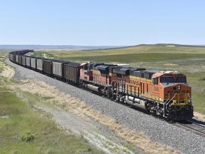FILE - A BNSF railroad train hauling carloads of coal from the Powder River Basin of Montana and Wyoming is seen east of Hardin, Mont., on July 15, 2020. Business and top officials are bracing for the possibility of a nationwide rail strike on Friday, Sept. 16, 2022, while talks continue between the nation's largest freight railroads and their unions.