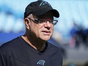 FILE - Carolina Panthers team owner David Tepper looks on before an NFL football game against the Minnesota Vikings on Oct. 17, 2021, in Charlotte, N.C. Tepper's real estate company filed court papers on Tuesday, Sept. 13, 2022, asking to revoke a bankruptcy settlement it was trying to make with a city and county in South Carolina over its abandoned practice facility.