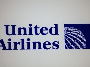 FILE - The logo for United Airlines is shown during a news conference in New York, Monday, May 3, 2010. United Airlines sees a market in whisking travelers to the airport in small, electric-powered air taxis. United said Thursday, Sept. 8, 2022, that it has invested $15 million in a startup manufacturer.