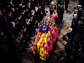 King Charles III and Camilla, Queen Consort, follow behind the coffin of Queen Elizabeth II as it is carried into St George's Chapel in Windsor Castle, for the Committal Service on Monday. A private burial was to have followed.