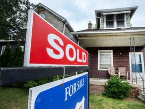 A home with a "sold" sign in Etobicoke, Ont.