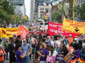 Union members and activist take part in the Labour Day Parade in Toronto, on Monday, September 5, 2022.&ampnbsp;A record labour shortage and rising wages may seem like good news for workers, but labour leaders say workers aren't seeing the gains that corporations are experiencing amidst sky-high inflation.