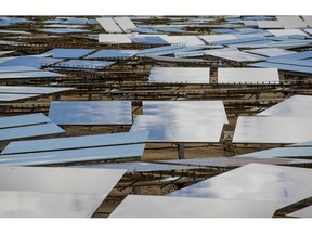 Solar panels stand at the Ivanpah Solar Electric Generating System in the Mojave Desert near Primm, Nevada.
