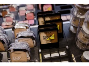 L'Oreal cosmetic products sit on display in a department store in Paris, France.
