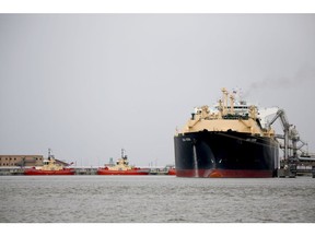 The Asia Vision LNG carrier ship sits docked at a terminal in Sabine Pass, Texas, U.S., on Monday, Feb. 22, 2016.  Photographer: Eric Kayne/Bloomberg