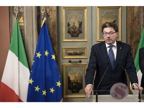 Giancarlo Giorgetti, deputy-secretary of the euroskeptic party League, speaks during a news conference following a meeting with Italy's Senate Speaker Elisabetta Casellati at the Giustiniani palace in Rome, Italy, on Wednesday, April 18, 2018. Italy's President Sergio Mattarella has asked Casellati to find out whether a center-right alliance and the anti-establishment Five Star Movement can form a government together and wants her to report back by Friday.