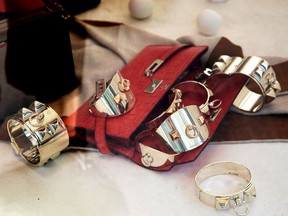 A selection of jewelry sits on display in the window of a Hermes International store in Paris, France, on Tuesday, July 28, 2020. LVMH Moet Hennessy Louis Vuitton SE follows Richemont and Burberry in reporting what analysts expect will be the industrys worst quarter ever because of the pandemic.