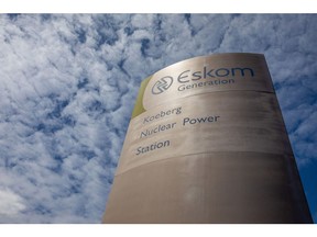 A sign at the entrance to Koeberg nuclear power station, operated by Eskom Holdings SOC Ltd., in Cape Town, South Africa, on Wednesday, Nov. 25, 2020. The decision to begin installing new steam generators at the Koeberg plant near Cape Town underscores state-owned Eskom's confidence that it will win approval to prolong production of low-emissions nuclear power into the middle of the century. Photographer: Dwayne Senior/Bloomberg
