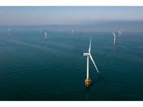 Wind turbines operate at Southwest Offshore Wind Farm in Buan, South Korea, on Thursday, March 25, 2021. The wind farm complex in the Southwest Sea will be expanded to 2.46 GW after 2027, according to Korea Offshore Wind Power Corp, a special purpose company formed by state-run Korea Electric Power Corp. and six other generators.
