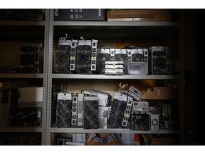 Mining rigs and power supply units awaiting repair inside the 3Logic mining equipment service center, in Moscow, Russia, on Wednesday, July 21, 2021. Bitcoin steadied as traders mulled the largest cryptocurrency's next move following a rebound stoked by comments from Elon Musk, Jack Dorsey and Cathie Wood.