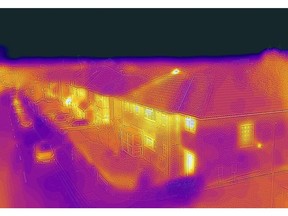 Residential homes, taken with a heat-sensing camera showing higher amounts of heat emitted in the brighter parts, in Kingston upon Thames, U.K., on Monday, Dec. 6, 2021. U.K. households, already bracing for their energy bills to rise by "several hundred pounds," will see a further jump following the collapse of Bulb Energy Ltd. and other suppliers, the regulator said. Photographer: Jason Alden/Bloomberg