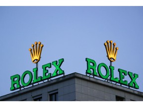 Signage for Rolex SA atop a building in the financial district of Frankfurt, Germany, on on Friday, May 6, 2022. Concerns about inflation are also stoking demand for some luxury timepieces because they can be seen as a store of value and a guard against currency fluctuations. Photographer: Alex Kraus/Bloomberg