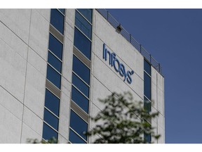 An Infosys Ltd. office building in the Electronic City area of Bengaluru, India, on Monday, Feb. 28, 2022. Revenue from IT players including Tata Consultancy Services and Infosys Ltd. should grow 15.5% in the year ending March 2022 to about $227 billion, industry association Nasscom says in a statement. Photographer: Dhiraj Singh/Bloomberg