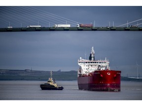 The STI Comandante tanker passes under the Queen Elizabeth II bridge after delivering a shipment of Russian diesel to Purfleet fuel terminal in Purfleet, U.K., on Tuesday, April 5, 2022. The U.K. announced in March that it will phase out imports of diesel from Russia over the year as a response to the country's invasion of Ukraine.
