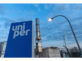 Signage for the Falkenhagen Power-to-Gas Pilot Plant operated by Uniper NV in Falkenhagen, Germany, on Monday, May 2, 2022. The pilot plant developed by Uniper, which posted a quarterly loss as it opted to keep natural gas in storage to sell later at higher prices, converts wind power into hydrogen and synthetic methane.