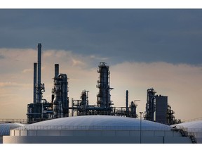 Storage tanks at the TotalEnergies SE Leuna oil refinery in Leuna, Germany, on Tuesday, June 7, 2022. TotalEnergies' 240,000 barrels per day Leuna refinery is set to cease importing Russian crude oil via the Druzhba pipeline some time later this year. Photographer: Krisztian Bocsi/Bloomberg