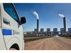 A corporate vehicle outside the Kusile coal-fired power station, operated by Eskom Holdings SOC Ltd., in Delmas, Mpumalanga province, South Africa, on Wednesday, June 8, 2022. The coal-fired plant's sixth and last unit is expected to reach commercial operation in two years, with the fifth scheduled to be done by December 2023.