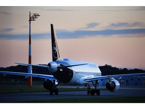 A passenger aircraft, operated by Deutsche Lufthansa AG, prepares to take-off at Munich International Airport in Munich, Germany, on Saturday, June 25, 2022. Although travel demand has rebounded dramatically in Europe, what had been touted as the aviation industry's long-awaited post-pandemic revival is being constrained by labor strife and limits in airport logistics. Photographer: Krisztian Bocsi/Bloomberg