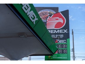 Signage with fuel prices at a Petroleos Mexicanos (PEMEX) gas station in Ciudad Juarez, Chihuahua state, Mexico on Thursday, July 21, 2022. As nations across the globe scramble for energy in the face of a pandemic supply crisis, extreme weather and the Russian war on Ukraine, Mexico -- at least, right now -- is sitting pretty. Photographer: Paul Ratje/Bloomberg