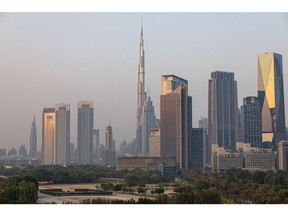 The Burj Khalifa skyscraper, center, amidst commercial and residential properties on the city skyline in downtown Dubai, United Arab Emirates, on Friday, Sept. 16, 2022. Office rents in Dubai are rebounding for the first time in six years, rising faster than in New York or London as global banks and businesses expand into the financial hub known for its love of glitzy construction.