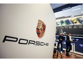 Signage for Porsche AG inside the Frankfurt Stock Exchange, operated by Deutsche Boerse AG, following the automaker's initial public offering (IPO) in Frankfurt, Germany, on Thursday, Sept. 29, 2022. The sports-car maker rose as much 2.9% to €84.90 after slipping to its offer price of €82.50 apiece, the top end of VW's initial range for the shares that valued the company at €75 billion ($73 billion). Photographer Alex Kraus/Bloomberg