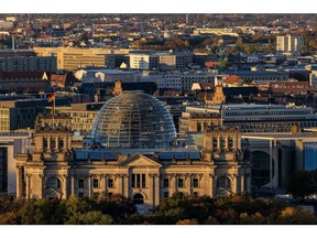 BERLIN, GERMANY - OCTOBER 19: General view during sunset on The Reichstag, which houses the Bundestag, the lower house of Germany's parliament on October 19, 2022 in Berlin, Germany. The German government is considering a partial price cap on natural gas prices for consumers and industry. For consumers the price would be set at 12 cents per kilowatt hour for the first 80% of the previous year's consumption amount and to begin in March, 2023. In addition the government would reimburse consumers for their December, 2022, natural gas bill.